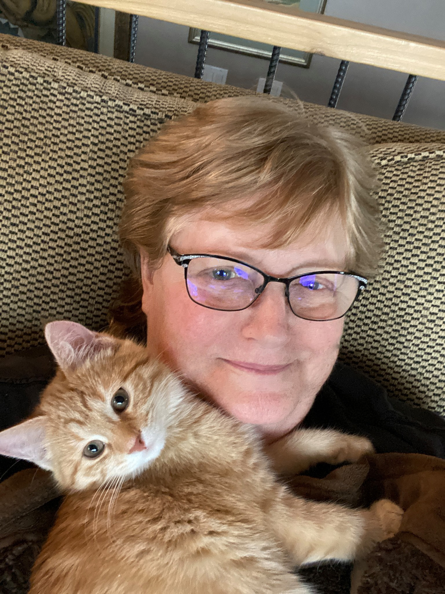 Debbie Battler with her cat Ginger